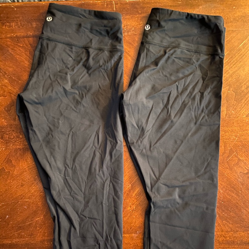 2 pairs of black lululemon wonder under crops